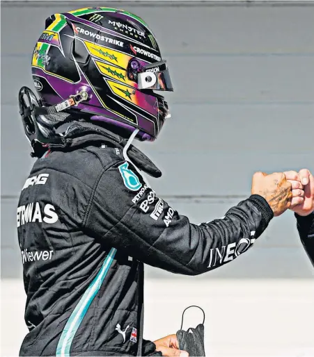  ?? ?? Best of enemies: Max Verstappen (right) and Lewis Hamilton (left) have produced an often bitter title battle that is set to go to the wire this season