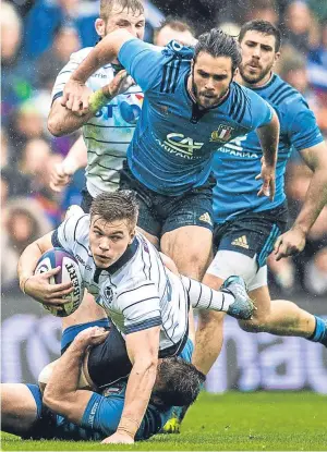  ?? Pictures: SNS. ?? Left: Tommy Seymour celebrates scoring Scotland’s fourth try; above: Huw Hones is taken down; below left: Cornell du Preez, centre, drives forward; below: Jonny Gray is tackled by Marcello Violi.