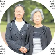  ?? Picture / Michael Craig ?? Jasmine Wong and her mother Fang Ling Wang, who was granted refugee status because of her Falun Gong links.