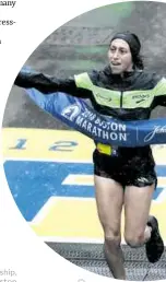  ??  ?? TRIUMPHANT Desiree Linden of Washington Township, Michigan, wins the women’s division of the 122nd Boston Marathon on Monday, April 16, 2018, in Boston. She is the first American woman to win the race since 1985.