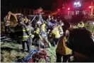  ?? Photograph: Steve Hill/AP ?? A man who was trapped in a storm drain was rescued with the help of emergency crews.