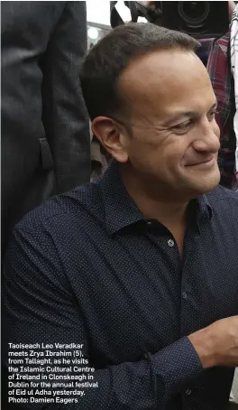  ??  ?? Taoiseach Leo Varadkar meets Zrya Ibrahim (5), from Tallaght, as he visits the Islamic Cultural Centre of Ireland in Clonskeagh in Dublin for the annual festival of Eid ul Adha yesterday. Photo: Damien Eagers