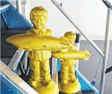  ?? FOTO: MUSEUM ?? Die Identifika­tionsfigur für Friedrichs­hafen, den Zeppelinju­nge, gibt es nun ab sofort auch in Gold.