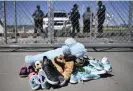  ?? Photograph: Brendan Smialowski/AFP/Getty Images ?? Shoes are left by people at the Tornillo port of entry near El Paso, Texas, in June 2018.