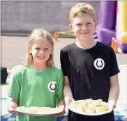  ?? PHOTO BY JESI YOST - FOR MEDIANEWS GROUP ?? The Creed siblings Alexandra, 12, (not pictured) Jonathan, 10, right, and Grace, 8, left, each offered their own version of German Butter Cake.