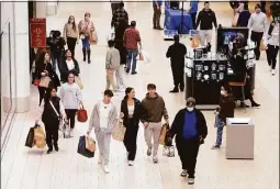  ?? Ned Gerard / Hearst Connecticu­t Media ?? Shoppers at Danbury Fair mall in Danbury on Black Friday in November 2021. Danbury Fair is lining up a new, $185 million mortgage on the property