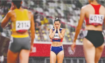  ?? DYLAN MARTINEZ/REUTERS ?? Amalie Iuel of Norway reacts after making a false start during a semifinal of the women's 400-metre hurdles.