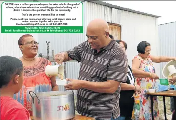  ?? Picture: MADELEINE CHAPUT ?? WELCOMED MEAL: Cedric Pringle, centre, with volunteer, Charlotte Sauls, left, dishing up soup for some of the children in East Bank, Buffalo Flats. Pringle has been running the Enkosi Trust for more than two years, an NPO that offers a daily soup...