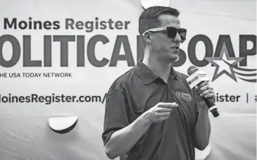  ?? LILY SMITH/THE REGISTER ?? Libertaria­n presidenti­al candidate Chase Oliver speaks at the Des Moines Register Political Soapbox during day 10 of the Iowa State on Saturday in Des Moines.