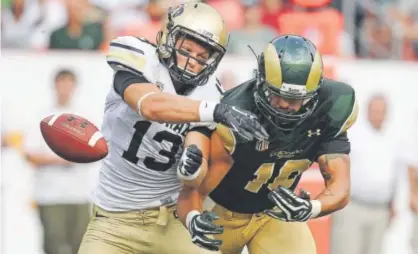  ??  ?? CU safety Parker Orms, left, breaking up a pass against CSU in the teams’ season opener Sept. 1 in Denver, says the explosive offenses in college football tempt him to consider playing anywhere but on defense. Helen H. Richardson, The Denver Post