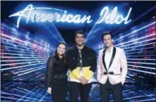  ?? ABC/ERIC MCCANDLESS ?? Madison VanDenburg of Cohoes represents the American Idol Top Three with Alejandro Aranda, center, and winner Laine Hardy, right.