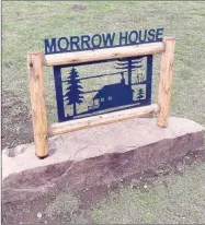  ??  ?? A modern sign is set in front of the historic Morrow House, located in the small community of Morrow in western Washington County.