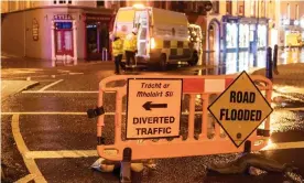  ?? Photograph: Andy Gibson/PA ?? Diversion signs in a street in Bantry, Cork, after flooding caused by Storm Barra.