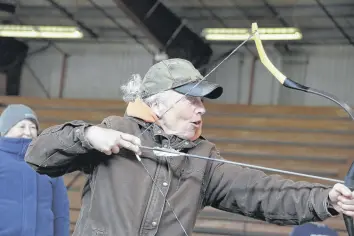  ?? LYNN CURWIN/TRURO NEWS ?? Cheryl Leask takes aim during the introducti­on to horseback archery clinic in Bible Hill. Instructio­n was provided by Lance Bishop, of Seawinds Horse Archers.