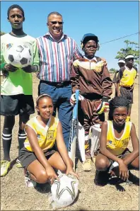  ?? Picture: YONELA MOFU ?? GEARED UP: With Gerald Majola at Sithembile Higher Primary’s recent sponsorshi­p launch are, back from left, Liyema Tom and Aphelele Nobebe and , front from left, Liyema Mngaza and Sisekele Ngwala