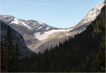  ?? ?? The Jackson Glacier, which has shrunk 40 per cent from 128 hectares down to 76 hectares as of 2015, viewed from the Jackson Glacier Overlook in Glacier National Park, Montana.