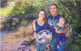  ?? COURTESY OF FINANCE NEW MEXICO ?? Bison Star Naturals owners Jacquelene and Angelo McHorse with their 1-year-old daughter, Judy.