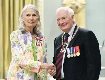  ?? JUSTIN TANG / THE CANADIAN PRESS ?? Poverty and homelessne­ss activist Jean Swanson of Vancouver is invested as a member of the Order of Canada by Governor General David Johnston in 2017.