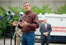  ?? (Photo by Ayleem Connolly) ?? Tennessee governor Bill Lee addresses reporters outside the former building of The Commercial Appeal on April 25, 2020.