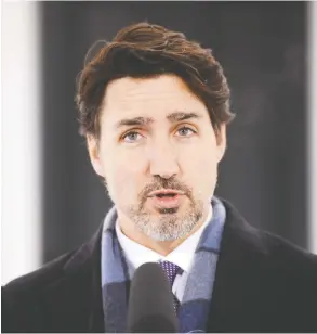  ?? SEAN KILPATRICK / THE CANADIAN PRESS ?? Prime Minister Justin Trudeau addresses Canadians on the COVID-19 situation
from his residence in Rideau Cottage in Ottawa on Tuesday.