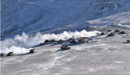  ??  ?? Indian and Chinese tanks in the process of disengagem­ent on the south banks of Pangong Tso.