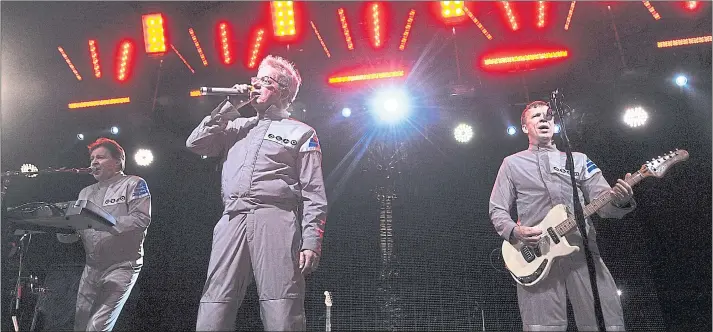  ?? THE ASSOCIATED PRESS ?? Devo will highlight the first day in two-day lineup for the 2018 Burger Boogaloo music festival at Mosswood Park in Oakland. The festival begins at noon both days.