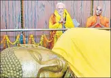  ?? HT PHOTO ?? PM at Mahaparini­rvana temple in Kushinagar