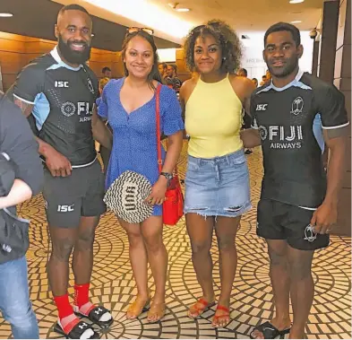  ?? Photo: Anasilini Natoga ?? Legendary Waisale Serevi and his family are amongst many Fijians in San Francisco to support the Fiji Airways Fijian 7s today when the Rugby World Cup Sevens begins. Pictured yesterday at the team’s hotel are Serevi’s daughters Una and Asinate with Fiji Airways Fijian 7s winger Semi Radradra (left), and playmaker Vatemo Ravouvou.