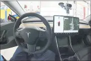  ?? JOHN SHISHMANIA­N – THE NORWICH BULLETIN VIA AP ?? Bhavesh Patel, 39, of Nottingham, England, pleaded guilty after he turned on the self-driving feature in his Model S and moved to the passenger seat.