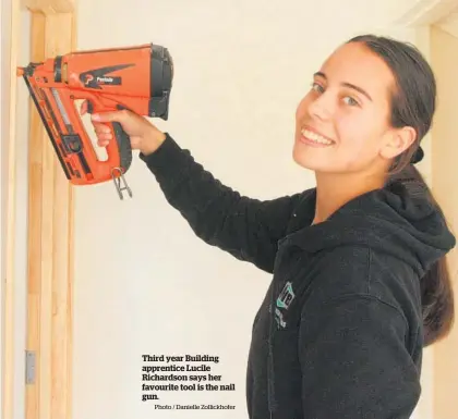  ?? Photo / Danielle Zollickhof­er ?? Third year Building apprentice Lucile Richardson says her favourite tool is the nail gun.
