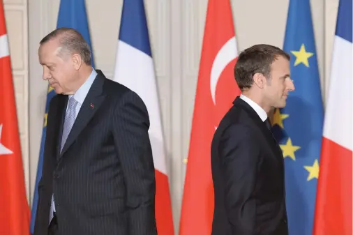  ??  ?? Turkish President Recep Tayyip Erdogan accuses French President Emmanuel Macron of oversteppi­ng ‘his limits’ and going ‘over his head.’ (File/AFP)