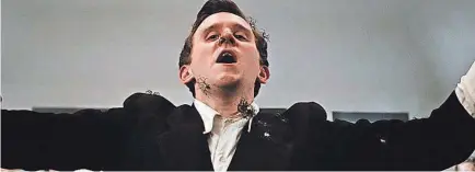  ?? NETFLIX ?? Harry Melling’s preacher Roy Laferty pours spiders on his face to show his faith in God in “The Devil All the Time.” And they are real spiders.