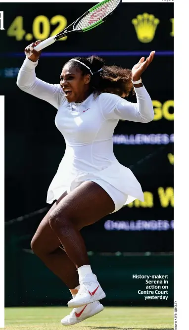  ??  ?? History-maker: Serena in action on Centre Court yesterday