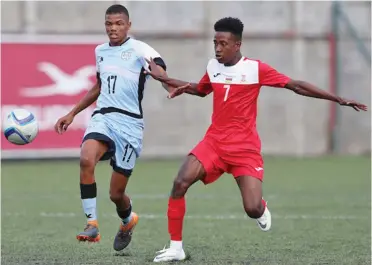  ?? FILE PIC: ?? Gabriel Vanneel of Botswana challenged by Jeremy Aurelien Kawoa of Mauritius during the 2018 Cosafa Under-17 Youth Championsh­ips between Mauritius and Botswana at the Francois Xavier Stadium in Port Louis, Mauritius on 19th July, 2018 [©Gavin Barker/backpagepi­x]