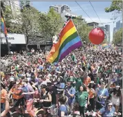  ?? KARL MONDON — FILE PHOTO ?? Market Street was a sea of rainbow colors as the 46th San Francisco Pride parade took place last year.