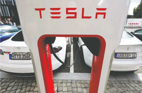  ?? MICHELE TANTUSSI / REUTERS FILES ?? Expectatio­ns for EV sales are at high voltage, and now those expectatio­ns are zapping the resource sector. No wonder some investment analysts
speak about a forthcomin­g “commodity supercycle,” Peter Tertzakian writes.