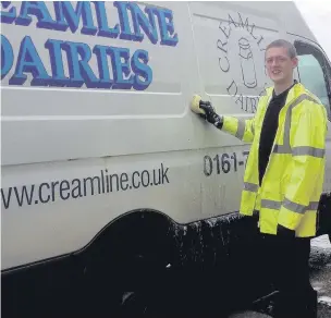  ??  ?? ●● A teenager from Cre8 in Macclesfie­ld cleans Crealine Dairy’s milk vans