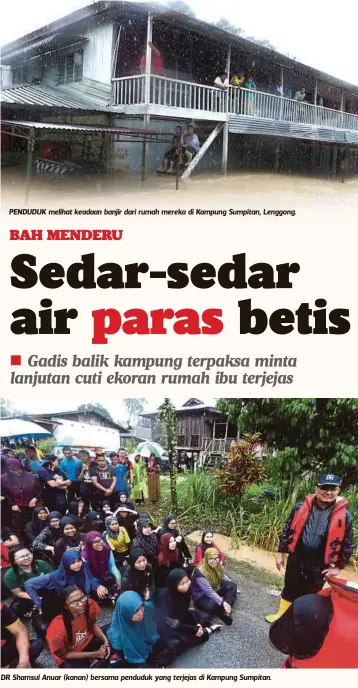  ??  ?? PENDUDUK melihat keadaan banjir dari rumah mereka di Kampung Sumpitan, Lenggong.
DR Shamsul Anuar (kanan) bersama penduduk yang terjejas di Kampung Sumpitan.