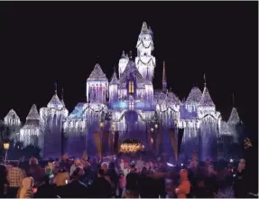  ?? PAUL HIFFMEYER/DISNEYLAND RESORT ?? Sleeping Beauty’s Castle is a centerpiec­e of holidays at Disneyland. Festivitie­s include the “Believe … in Holiday Magic” fireworks.