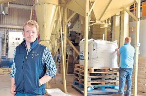  ??  ?? Ugie Valley Feed’s Fraser Mackintosh at the machine that produces the pellets.