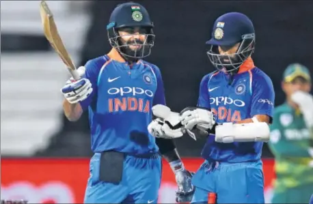  ?? AFP ?? India skipper Virat Kohli (left) and Ajinkya Rahane produced a stand of 189 runs, third best against South Africa, at Kingsmead on Thursday.