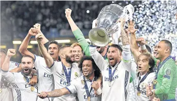  ?? EPA ?? Real Madrid captain Sergio Ramos lifts the Uefa Champions League trophy after their win over Juventus.