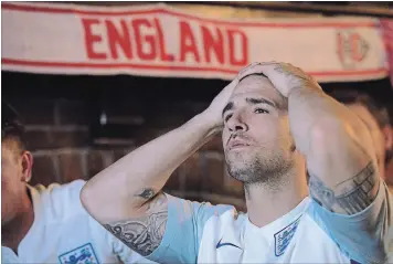  ??  ?? BOTTOM : In the end, there was no joy at Ye Olde Squire at Upper Wentworth and Fennell Avenue, where English soccer fans packed the bar to watch the semifinal match between England and Croatia.