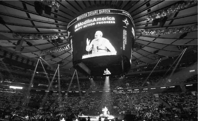  ?? Jason DeCrow / th e Associat ed Press ?? Prime Minister Narendra Modi of India urged 18,000 supporters Sunday in New York’s Madison Square Garden to help him build his country’s economy.