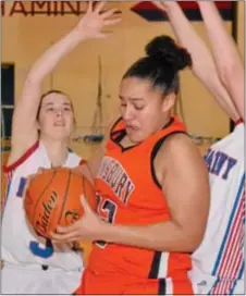  ?? Photo courtesy J. S. Garber ?? Pennsbury junior Sejanna Bethea, center, is guarded closely by Neshaminy defenders in a recent win that favored the Falcons.