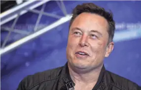  ?? HANNIBAL HANSCHKE/AP FILE ?? Elon Musk appeared to criticize Twitter’s permanent ban of President Donald Trump last year for messages that the tech company said helped incite the Jan. 6, 2021, insurrecti­on at the U.S. Capitol.