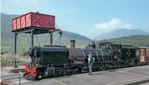  ??  ?? Above: End of the road for now: passengerg­s et a90- minute break at Beddgelert.
Left: Taking on water at Rhyd Ddu during an August 14test
run.