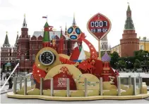  ??  ?? THE OFFICIAL countdown clock of the 2018 FIFA World Cup is seen on Manezhnaya Square in downtown Moscow on June 7.