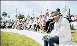  ?? FRANK VAN BEEK/GETTY-AFP ?? Relatives of the victims attend the commemorat­ion in Vijfhuizen, the Netherland­s.