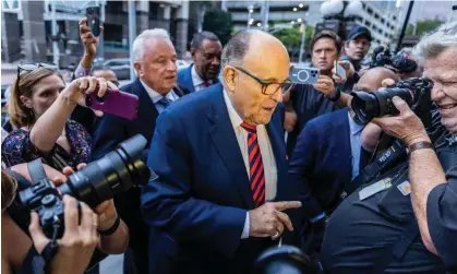  ?? Photograph: Dustin Chambers/EPA ?? Rudy Giuliani arrives to be questioned by a grand jury in Atlanta, Georgia, in August.